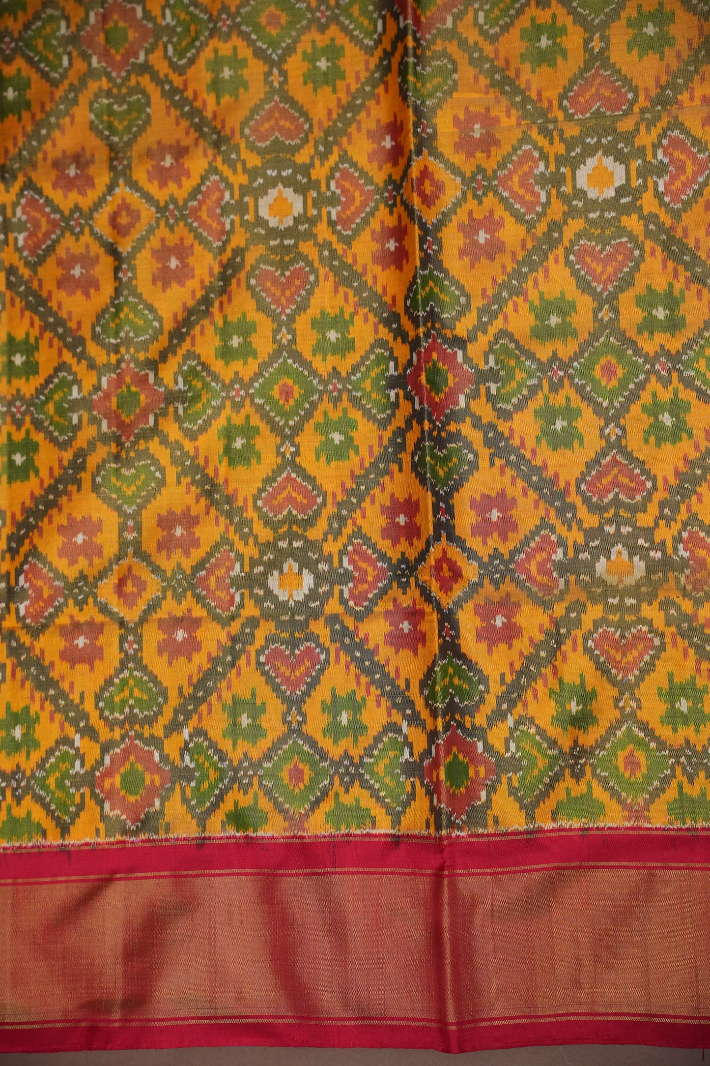 Mustard Yellow Pochampally Ikkat Silk Saree with Red Tissue Border