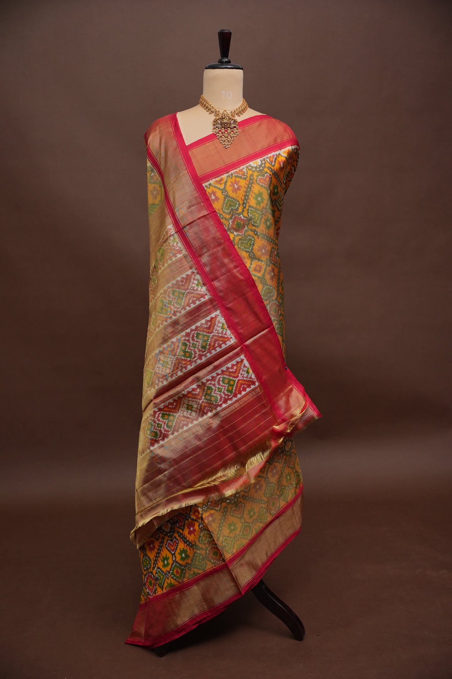 Mustard Yellow Pochampally Ikkat Silk Saree with Red Tissue Border