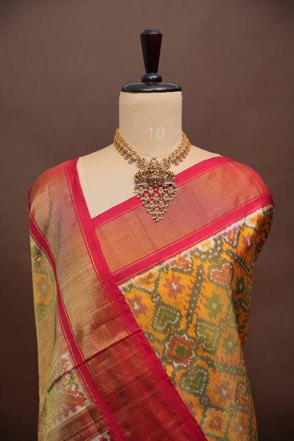 Mustard Yellow Pochampally Ikkat Silk Saree with Red Tissue Border