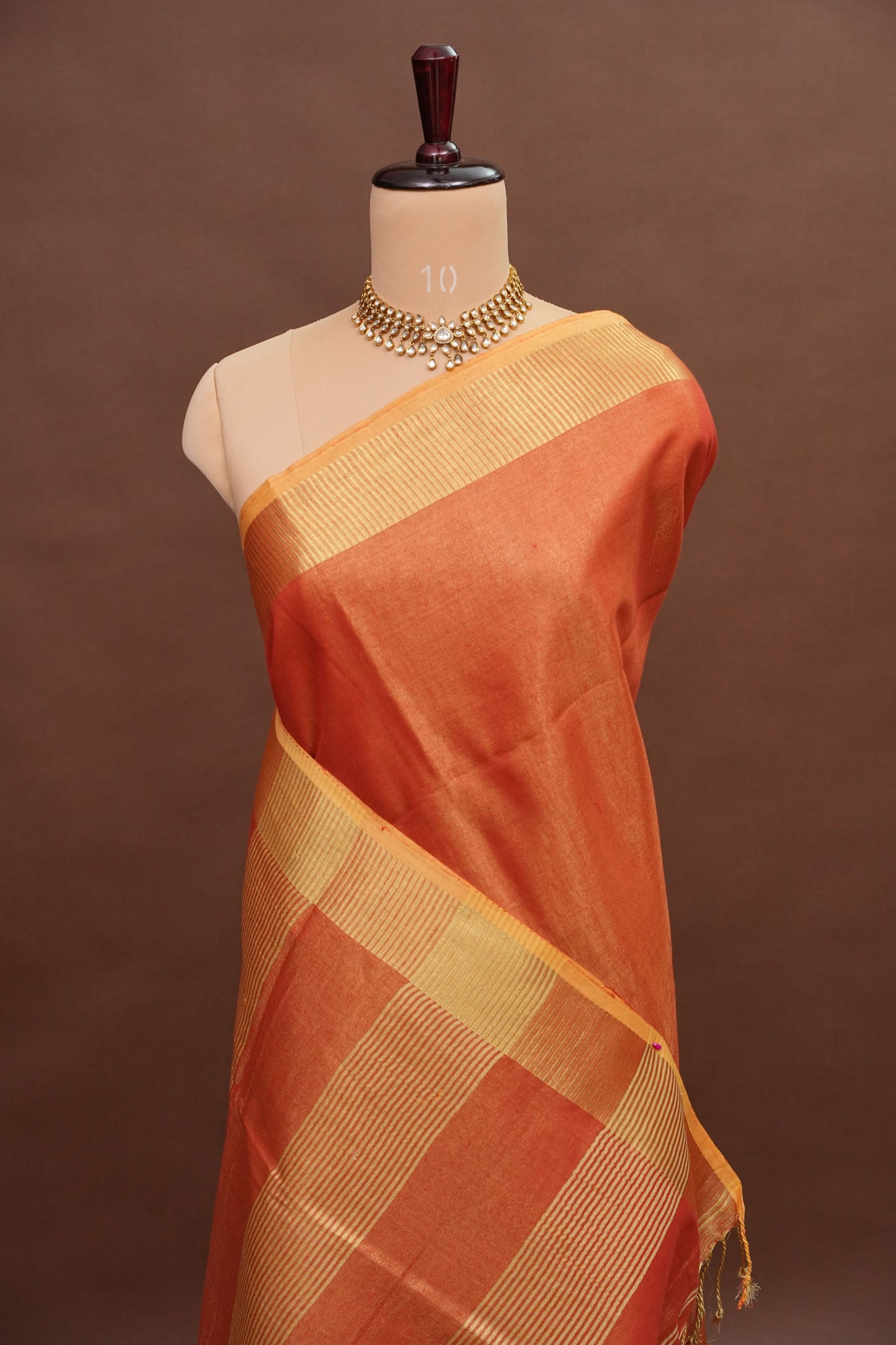 Tissue Linen Silk Saree – Coral Peach with Classic Gold Zari Border