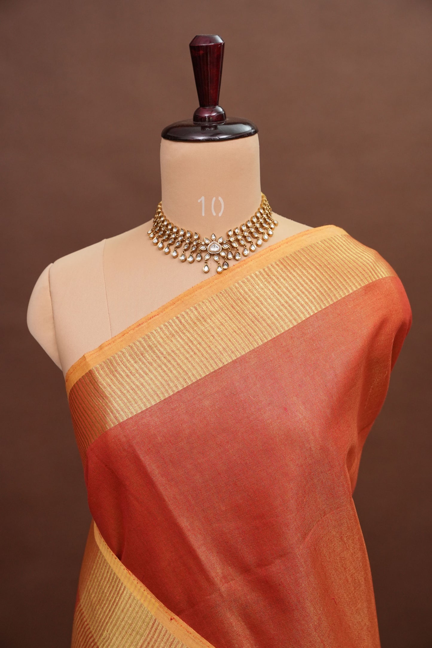 Tissue Linen Silk Saree – Coral Peach with Classic Gold Zari Border