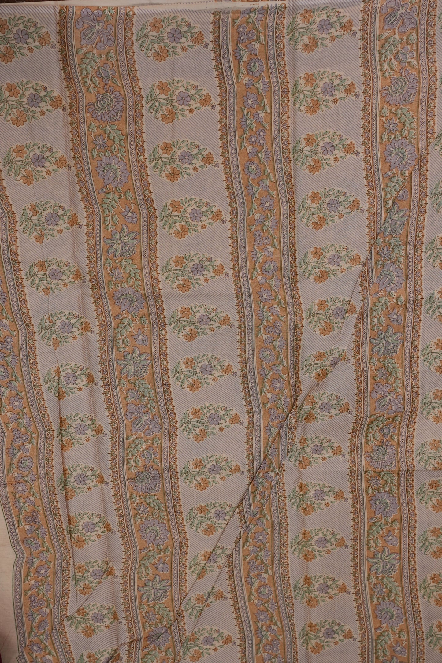 Elegant Pastel Floral cotton Saree – Soft Ivory with Multicolor Woven Buttas