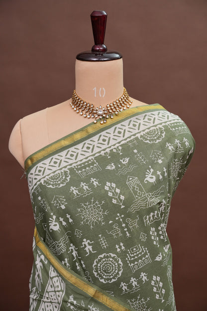 Earthy Elegance Handloom cotton Saree – Olive Green with Tribal Motifs