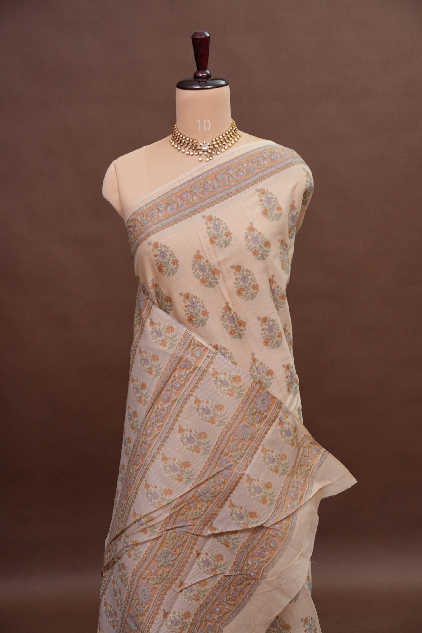 Elegant Pastel Floral cotton Saree – Soft Ivory with Multicolor Woven Buttas