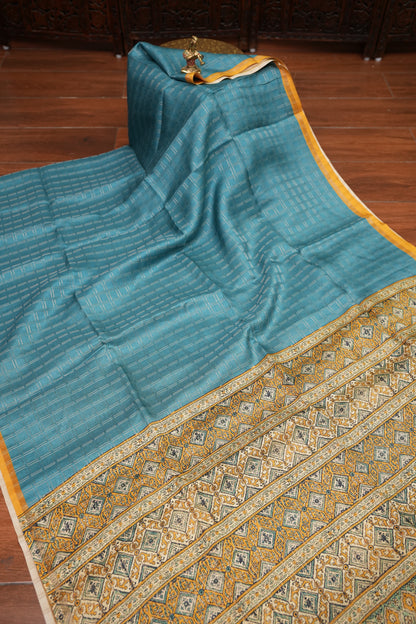 Tussar Raw Silk Saree with Checkered Body & Ajrakh Printed Pallu and Blouse – Turquoise Blue & Mustard