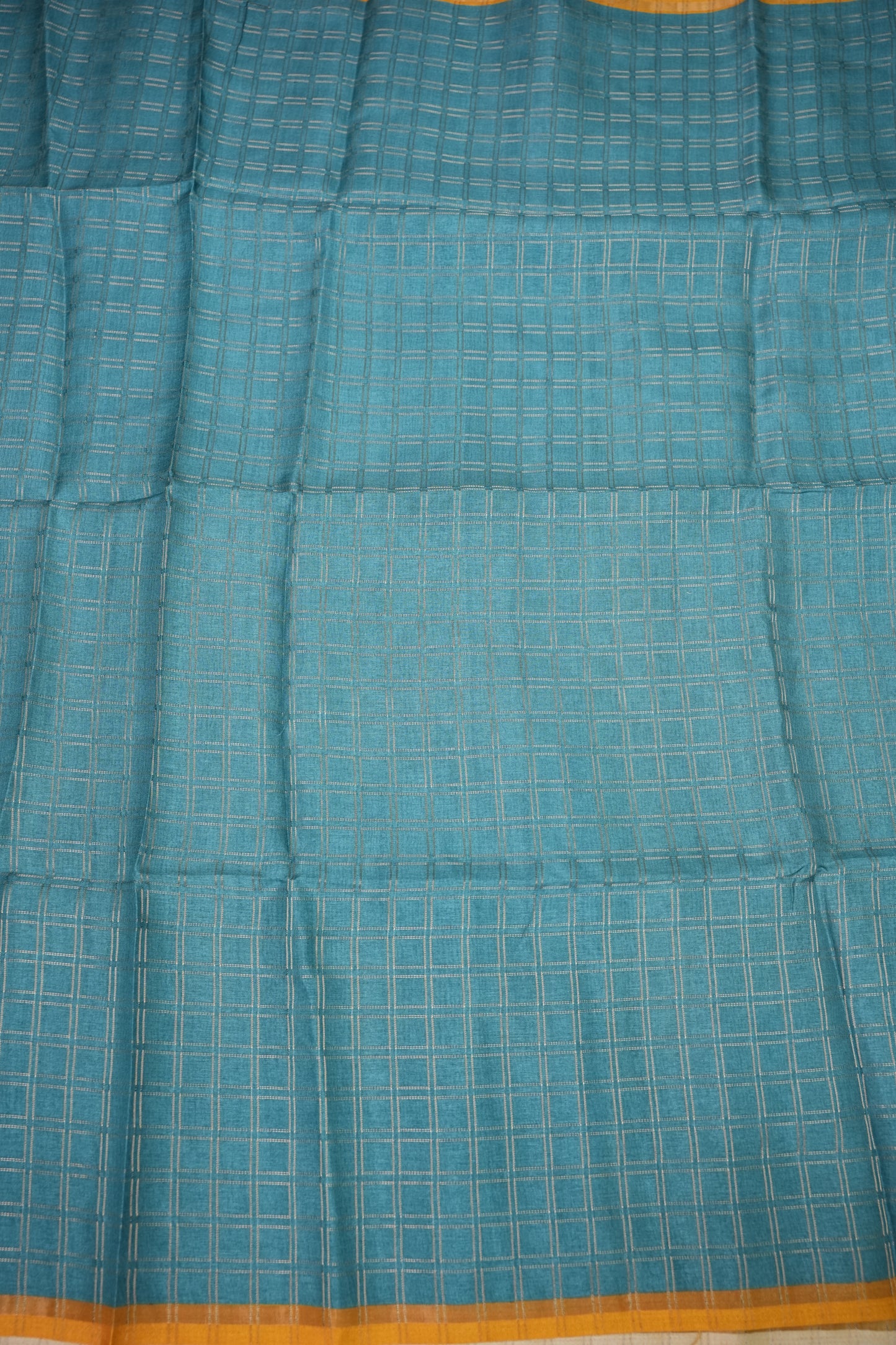 Tussar Raw Silk Saree with Checkered Body & Ajrakh Printed Pallu and Blouse – Turquoise Blue & Mustard