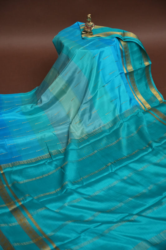 Multi Blue Shades in Pure Crepe Mysore Silk Saree With Self Retta Pet Border