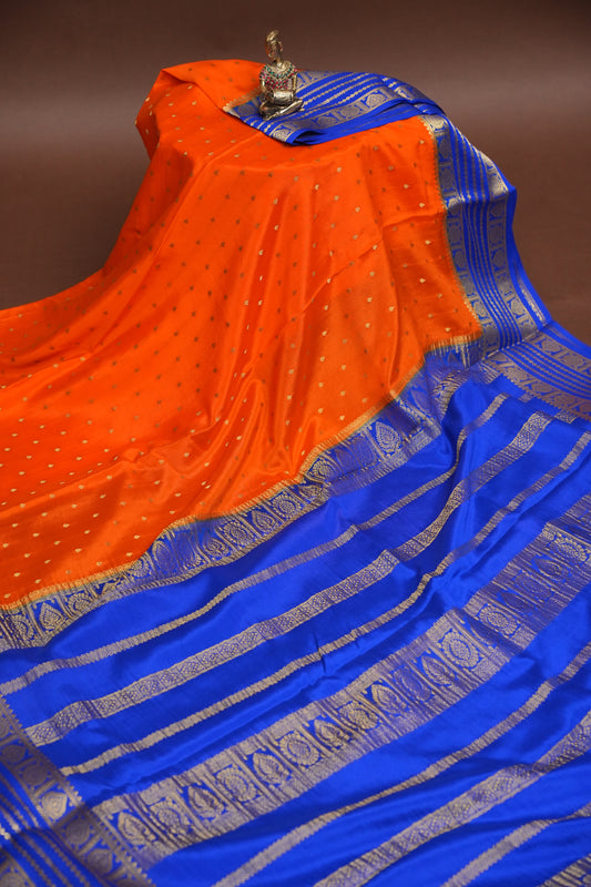 Pure Crepe Mysore Silk Saree in Orange With Contrast Ink Blue Border