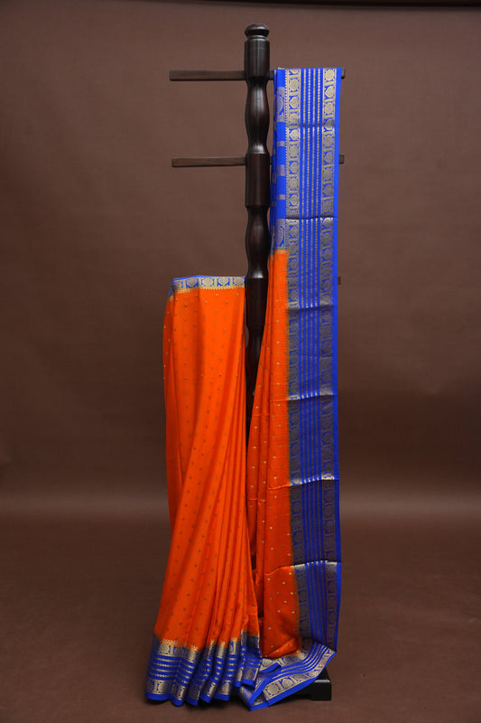 Pure Crepe Mysore Silk Saree in Orange With Contrast Ink Blue Border