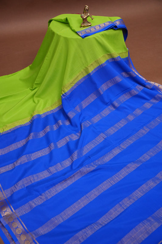 Plain Pure Crepe Mysore Silk Saree in Parrot Green With Contrast Ink Blue Pallu & Blouse