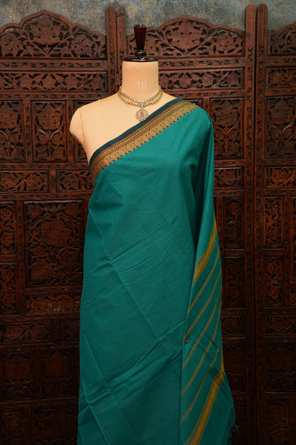 Pure Kanchi Cotton Saree – Peacock Green with Traditional Gold Zari Border