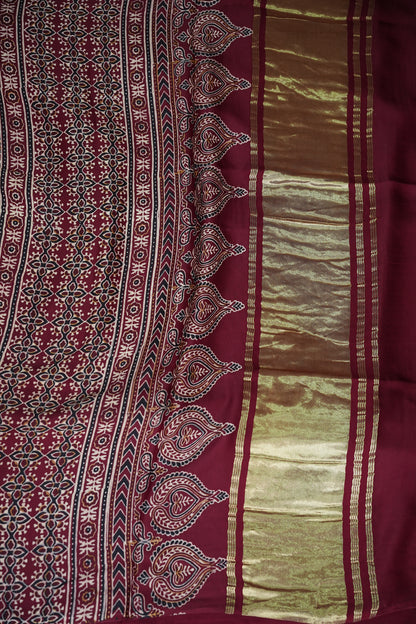 Pure Modal Silk Saree in Maroon with Bandhej-Inspired Ajrakh Print Pallu