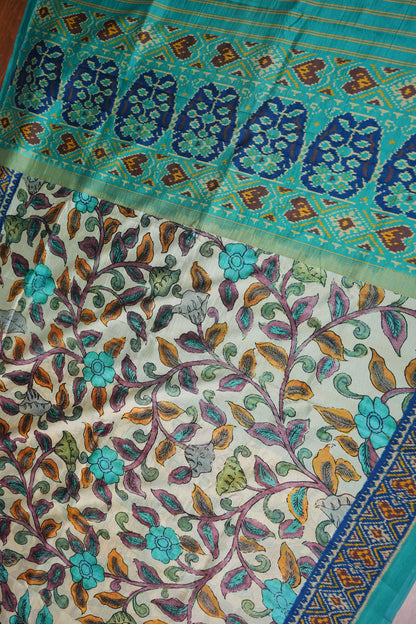 Tussar Saree with Kalamkari Body & Patola-Inspired Border and Pallu – Beige & Turquoise Blue
