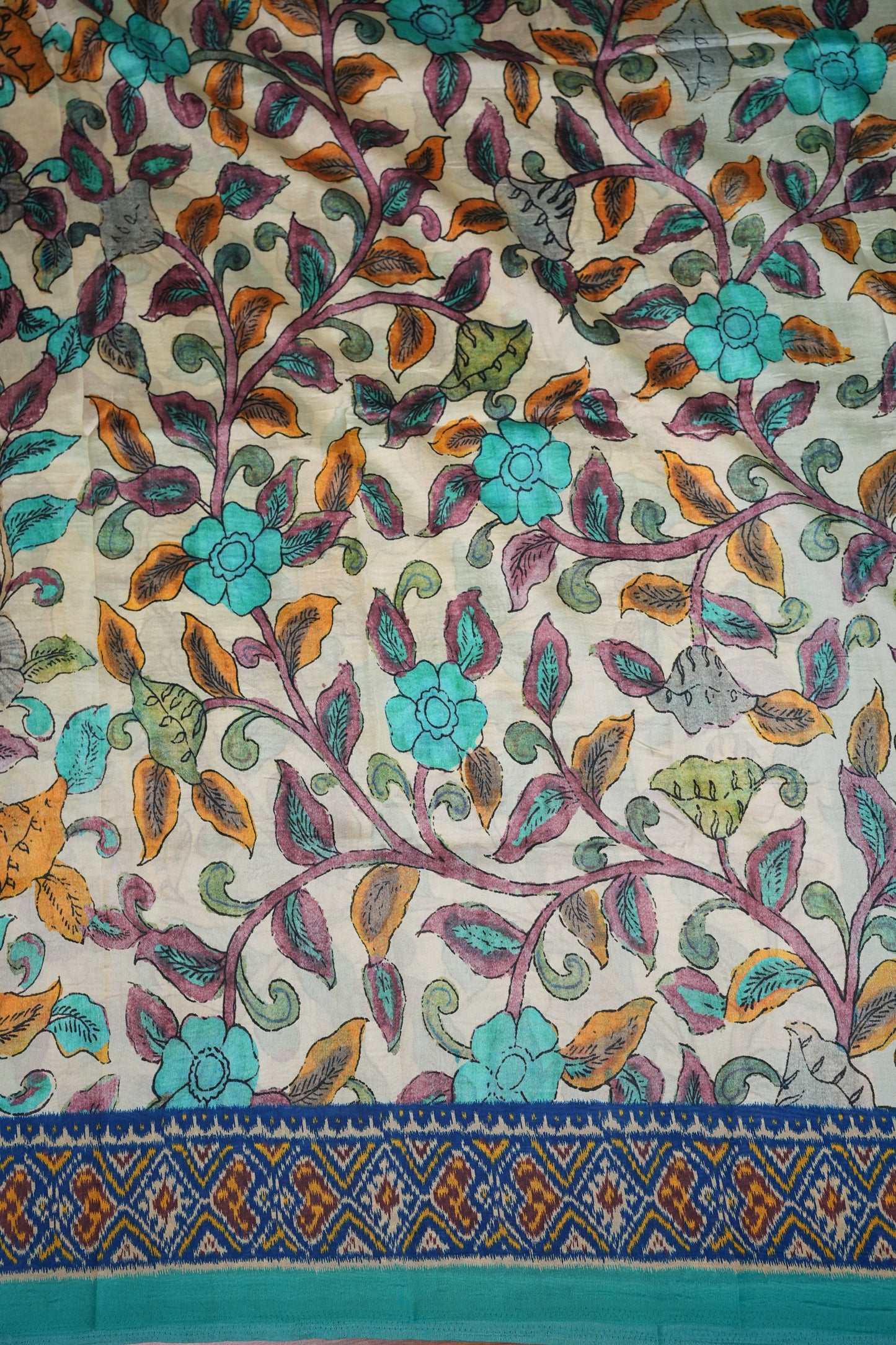 Tussar Saree with Kalamkari Body & Patola-Inspired Border and Pallu – Beige & Turquoise Blue