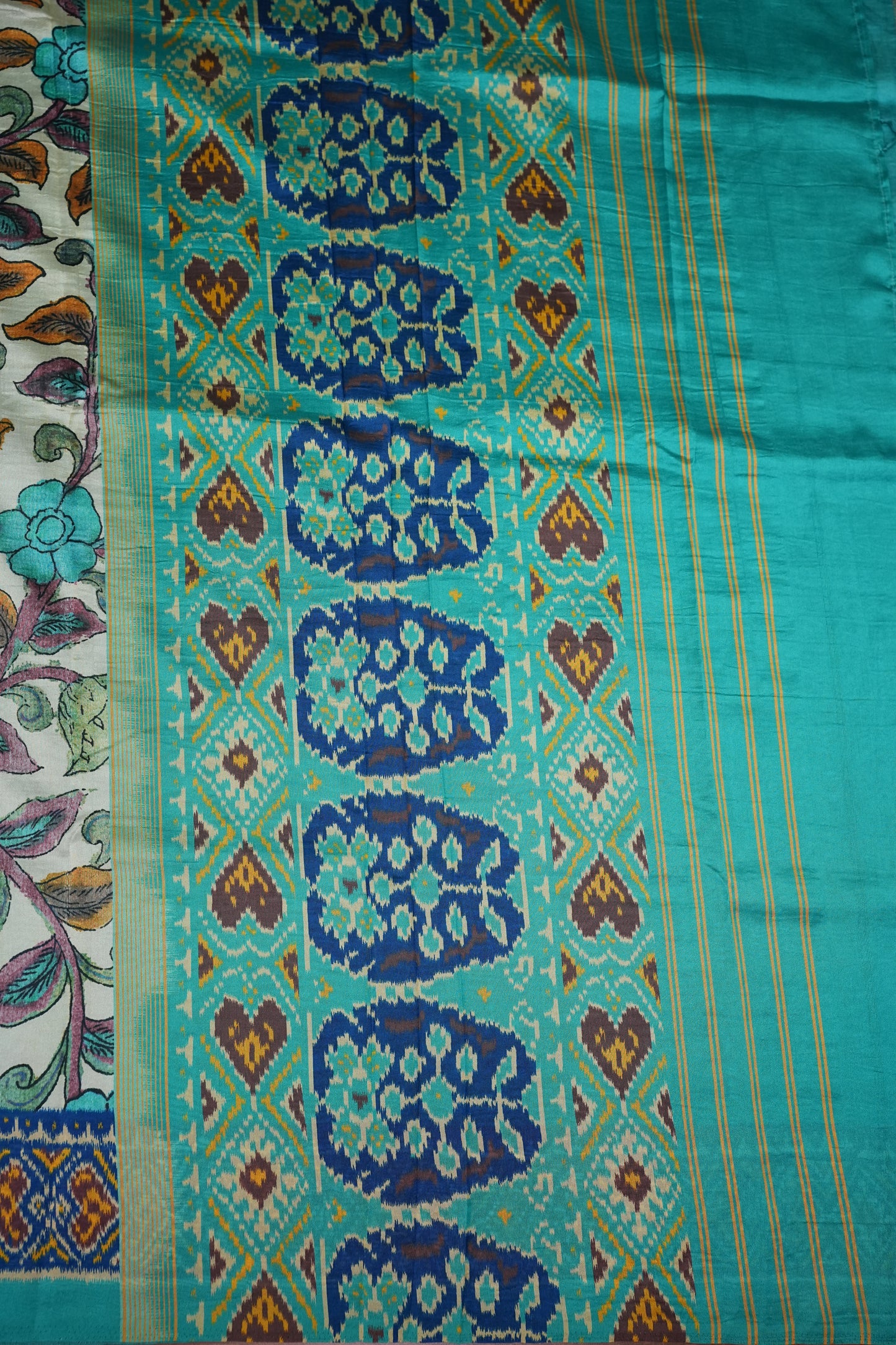 Tussar Saree with Kalamkari Body & Patola-Inspired Border and Pallu – Beige & Turquoise Blue