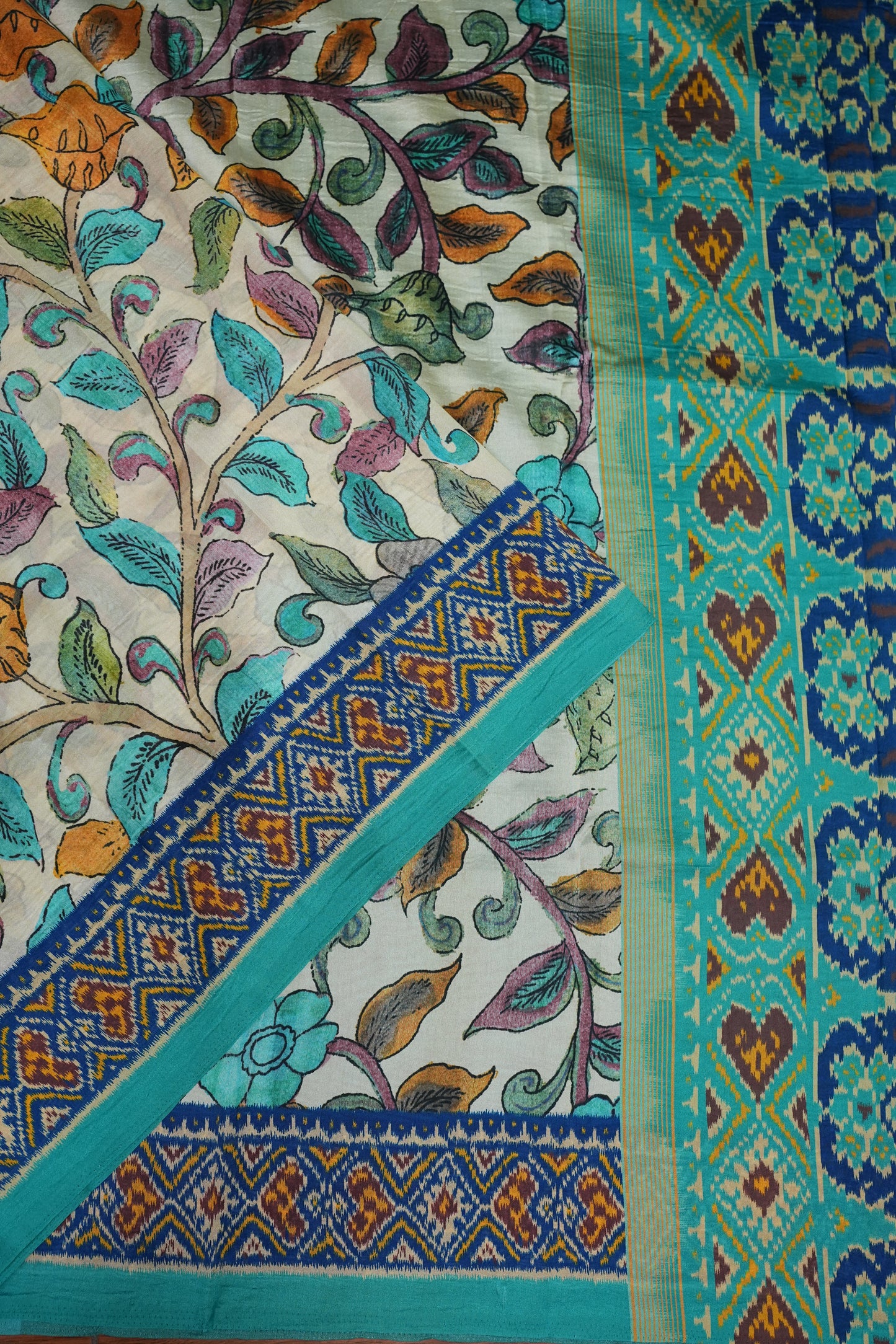 Tussar Saree with Kalamkari Body & Patola-Inspired Border and Pallu – Beige & Turquoise Blue