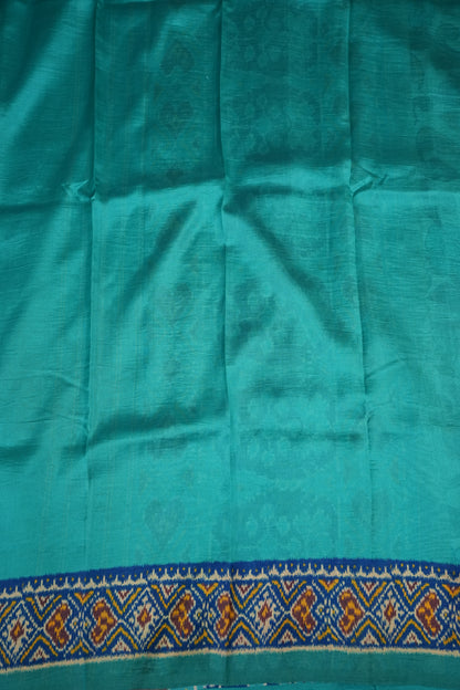 Tussar Saree with Kalamkari Body & Patola-Inspired Border and Pallu – Beige & Turquoise Blue