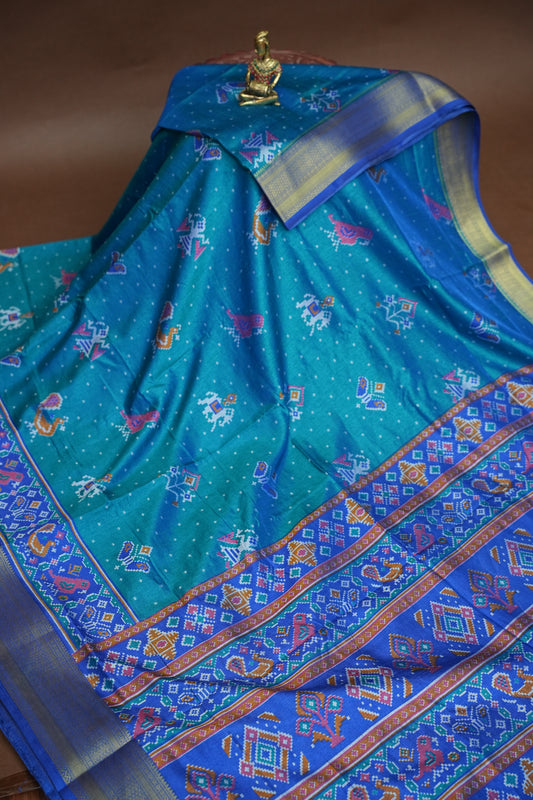 Teal Blue Semi Silk Saree with Traditional Ikat-Inspired Woven Motifs & Designer Pallu