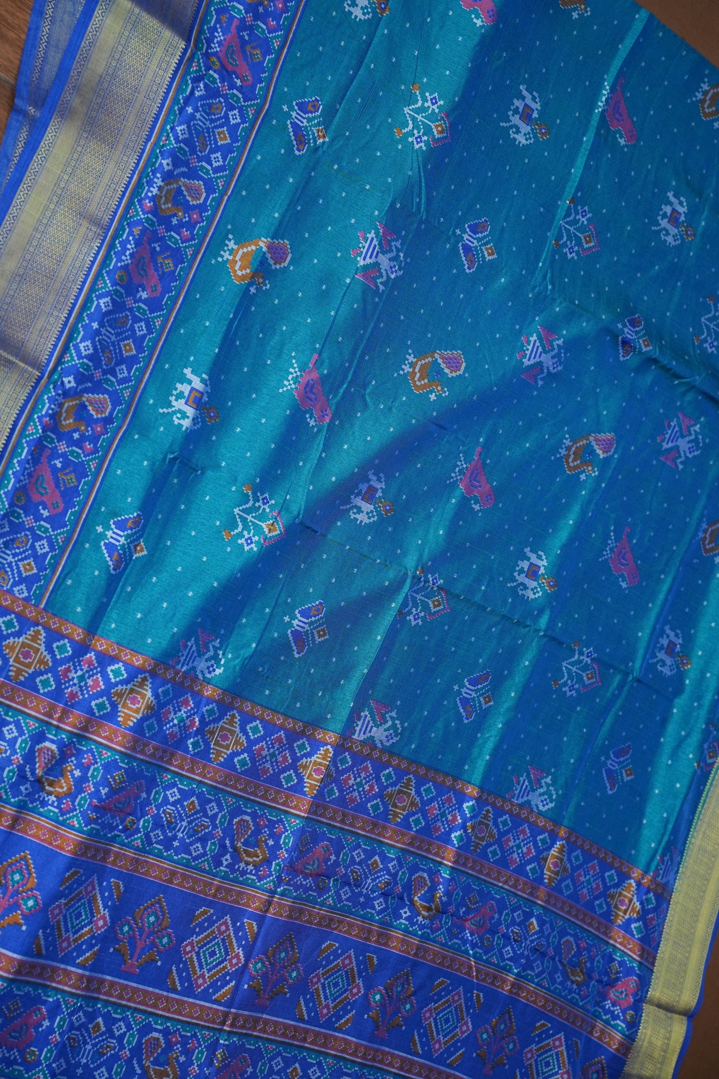 Teal Blue Semi Silk Saree with Traditional Ikat-Inspired Woven Motifs & Designer Pallu