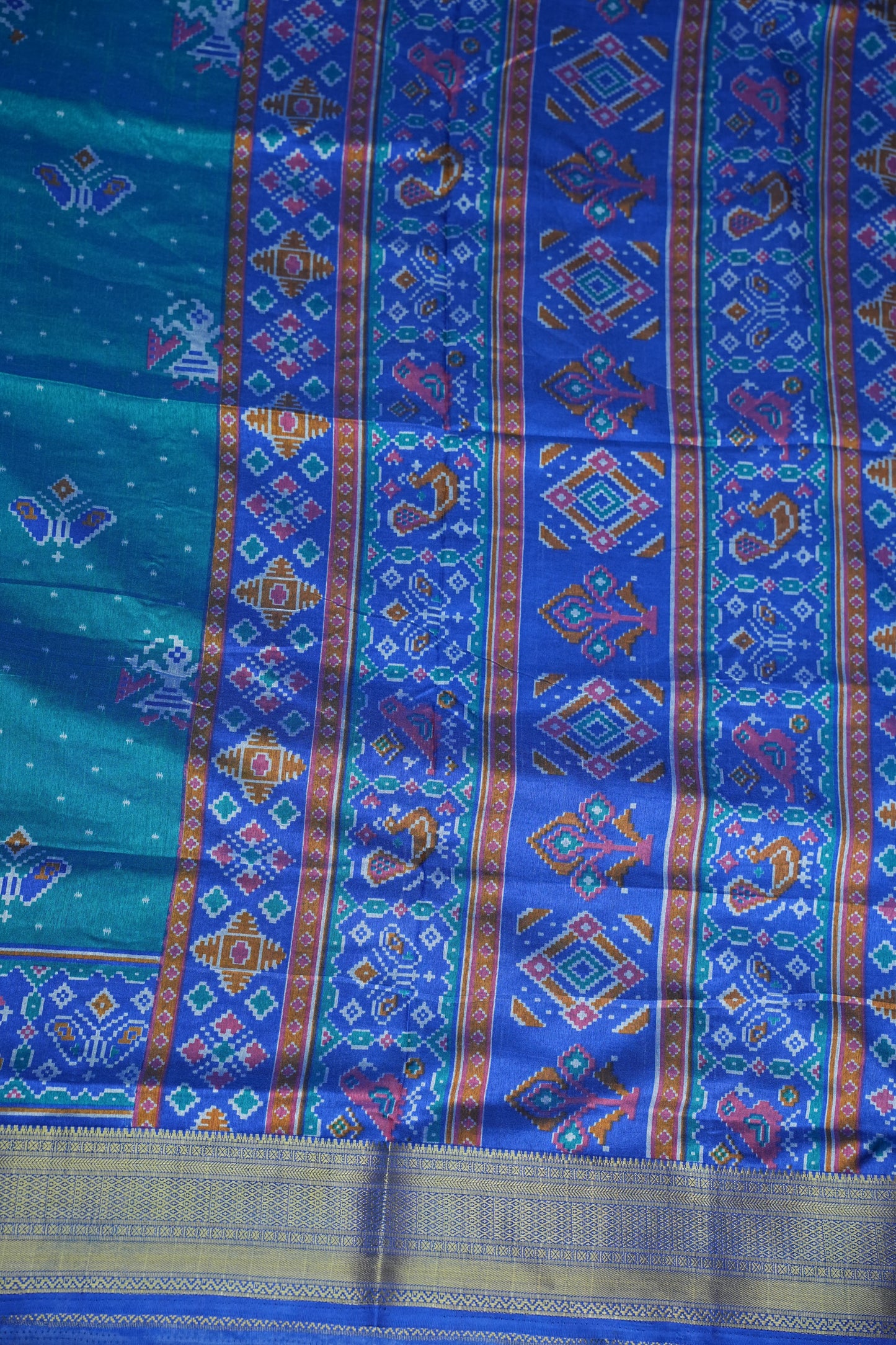 Teal Blue Semi Silk Saree with Traditional Ikat-Inspired Woven Motifs & Designer Pallu