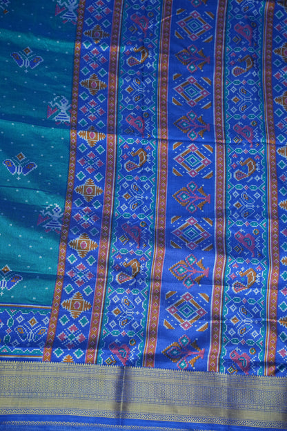 Teal Blue Semi Silk Saree with Traditional Ikat-Inspired Woven Motifs & Designer Pallu