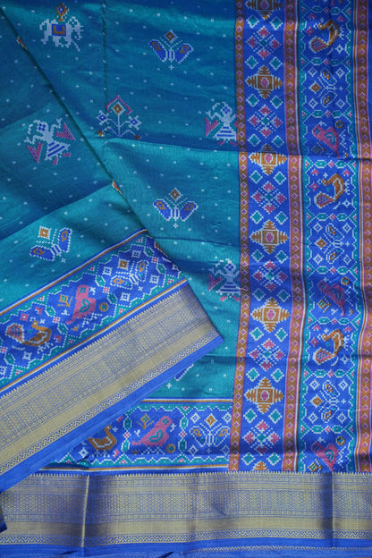 Teal Blue Semi Silk Saree with Traditional Ikat-Inspired Woven Motifs & Designer Pallu