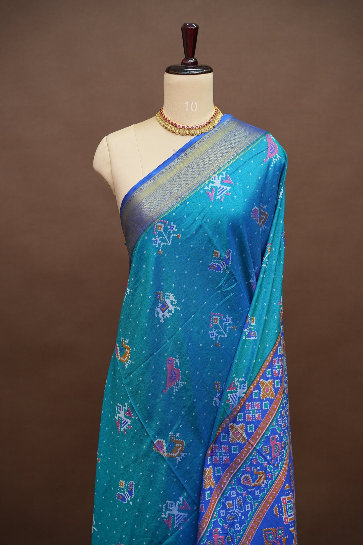 Teal Blue Semi Silk Saree with Traditional Ikat-Inspired Woven Motifs & Designer Pallu