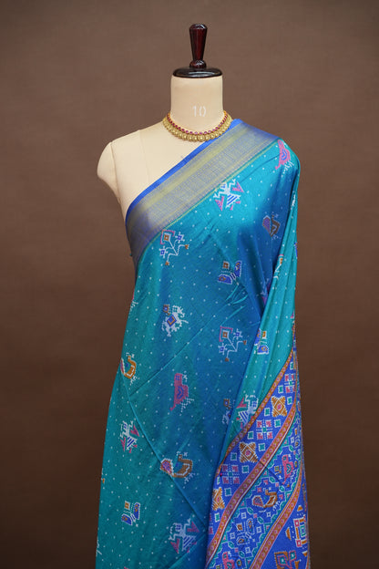 Teal Blue Semi Silk Saree with Traditional Ikat-Inspired Woven Motifs & Designer Pallu