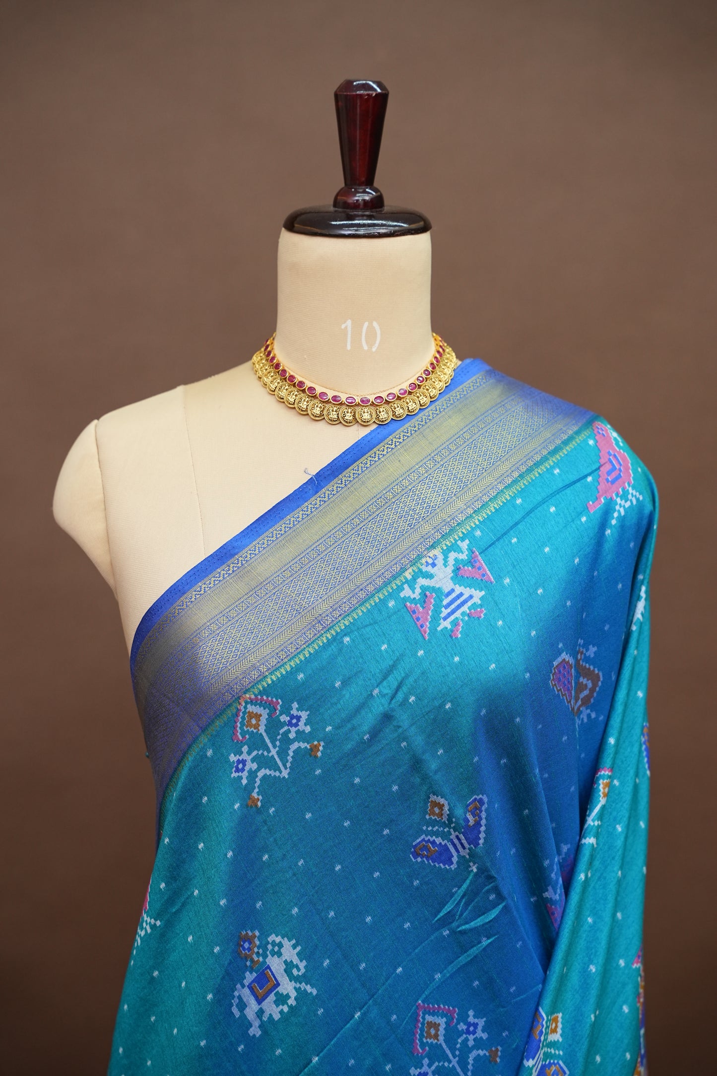 Teal Blue Semi Silk Saree with Traditional Ikat-Inspired Woven Motifs & Designer Pallu