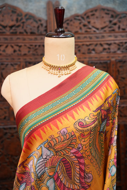 Tussar Saree with Kalamkari Body & Patola-Inspired Border and Pallu – Mustard & Teal Green