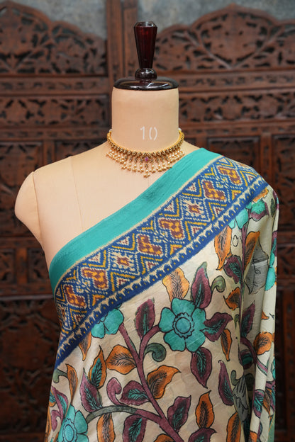 Tussar Saree with Kalamkari Body & Patola-Inspired Border and Pallu – Beige & Turquoise Blue