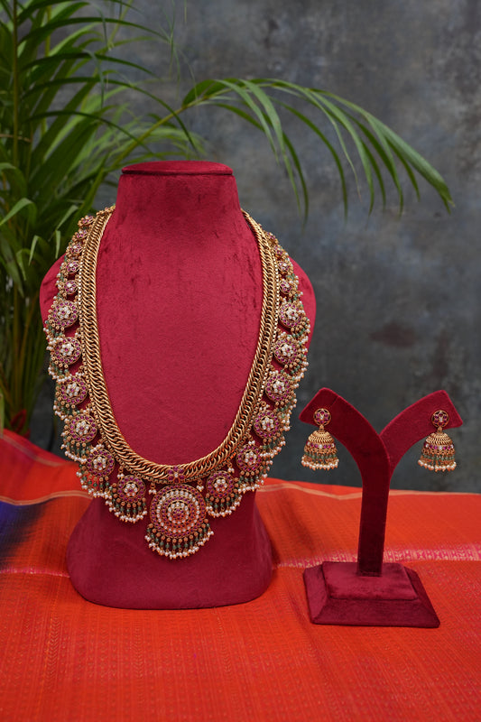 Grand Statement Antique Gold-Plated Temple Haaram Set with Ruby Stone Detailing