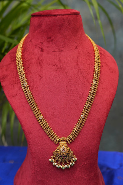 Sleek Statement Antique Long Haaram Set with Pearl & Green Bead Detailing