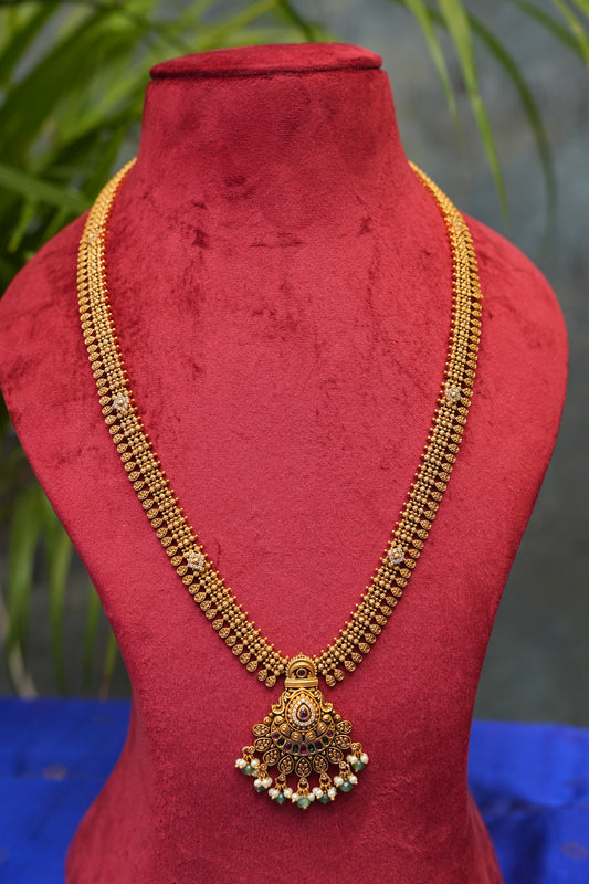 Sleek Statement Antique Long Haaram Set with Pearl & Green Bead Detailing