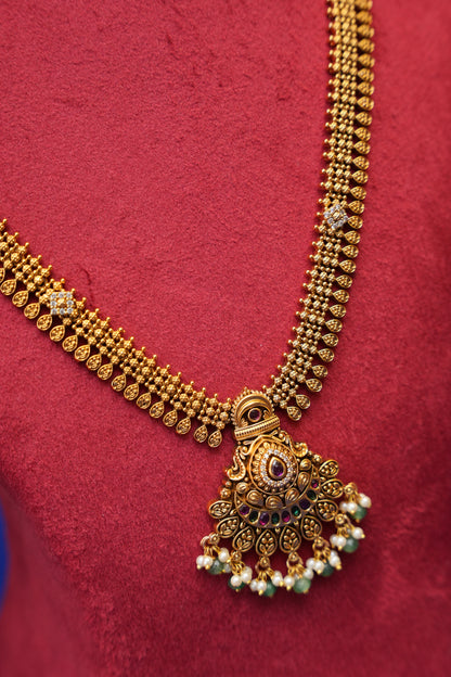 Sleek Statement Antique Long Haaram Set with Pearl & Green Bead Detailing