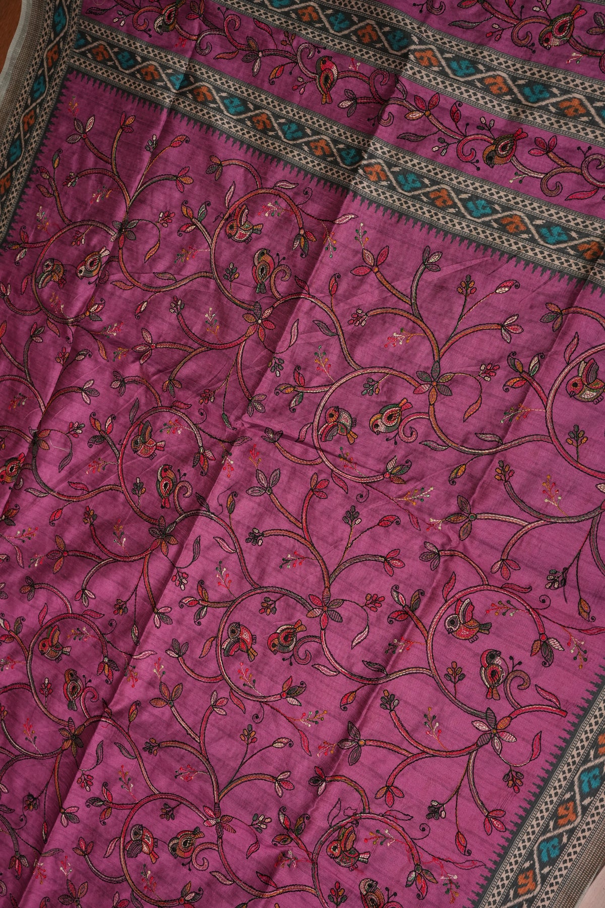 Semi Raw Silk Saree with Embroidered Body & Patola Styled Borders – Magenta Pink