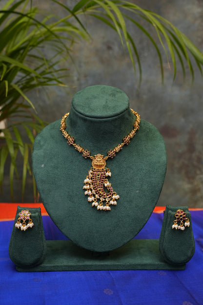 Antique Gold-Plated Lakshmi Paisley Pendant Necklace Set with Pearl Drops
