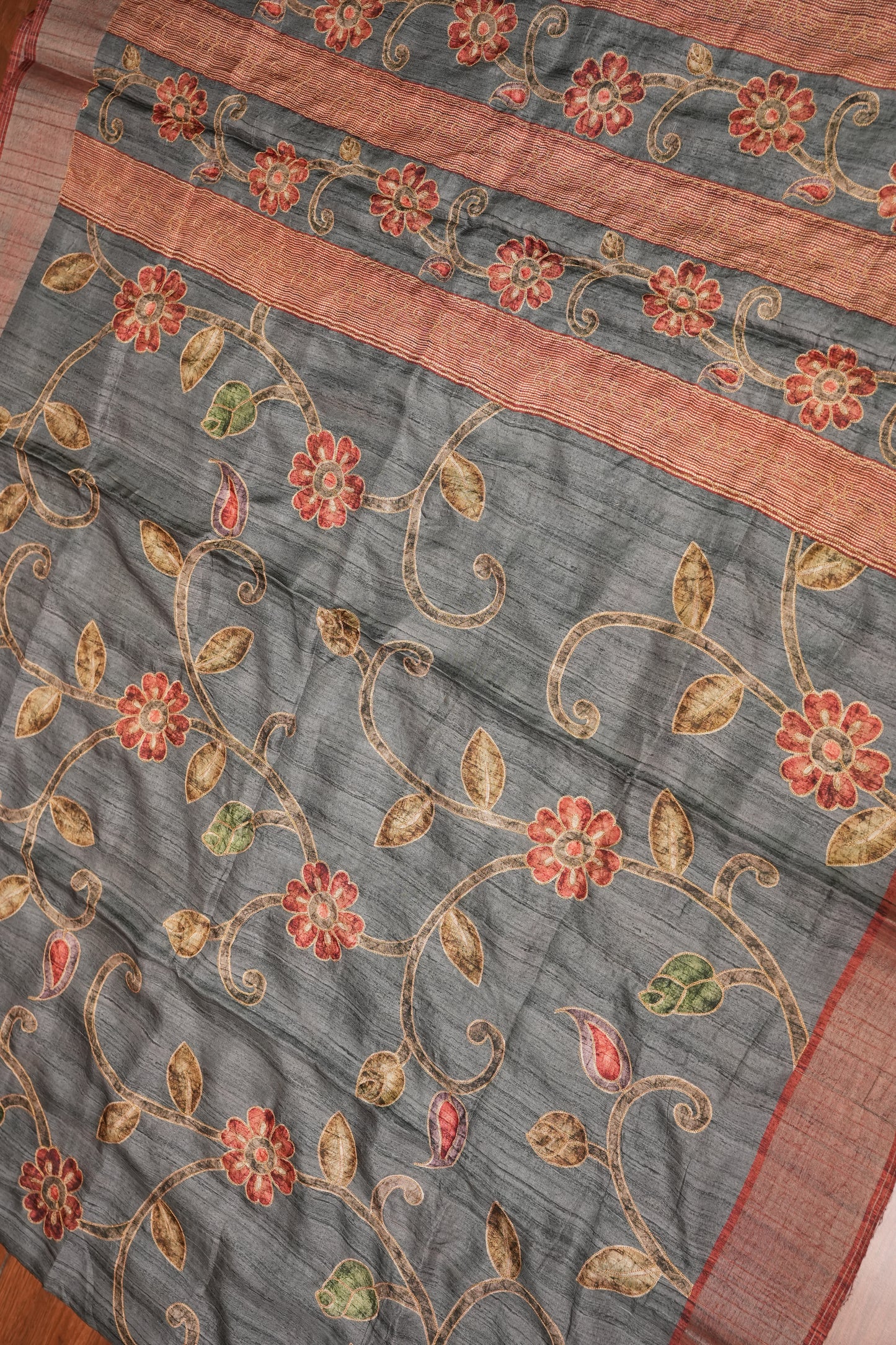 Semi Tussar Raw Silk Saree with Embroidered Floral Body & Contrast Border – Charcoal Grey & Rust