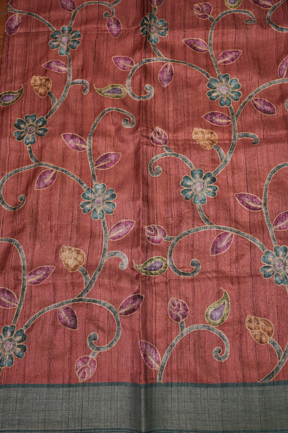 Semi Tussar Raw Silk Saree with Embroidered Floral Body & Contrast Border – Rust & Charcoal Grey