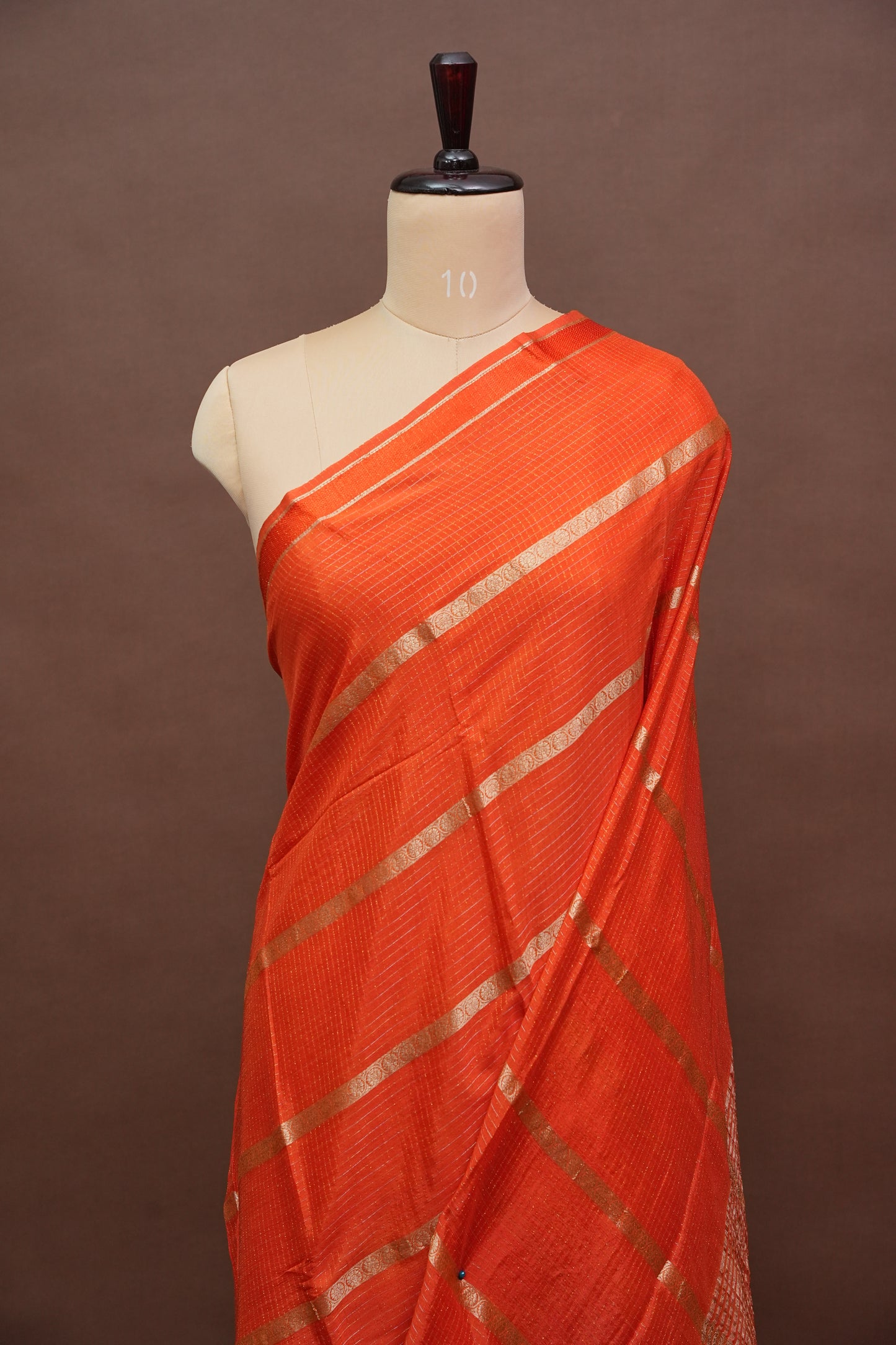 Coral Orange Crepe Silk Saree with Antique Gold Zari Border and Microchecks