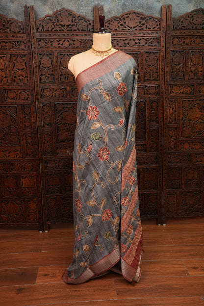 Semi Tussar Raw Silk Saree with Embroidered Floral Body & Contrast Border – Charcoal Grey & Rust