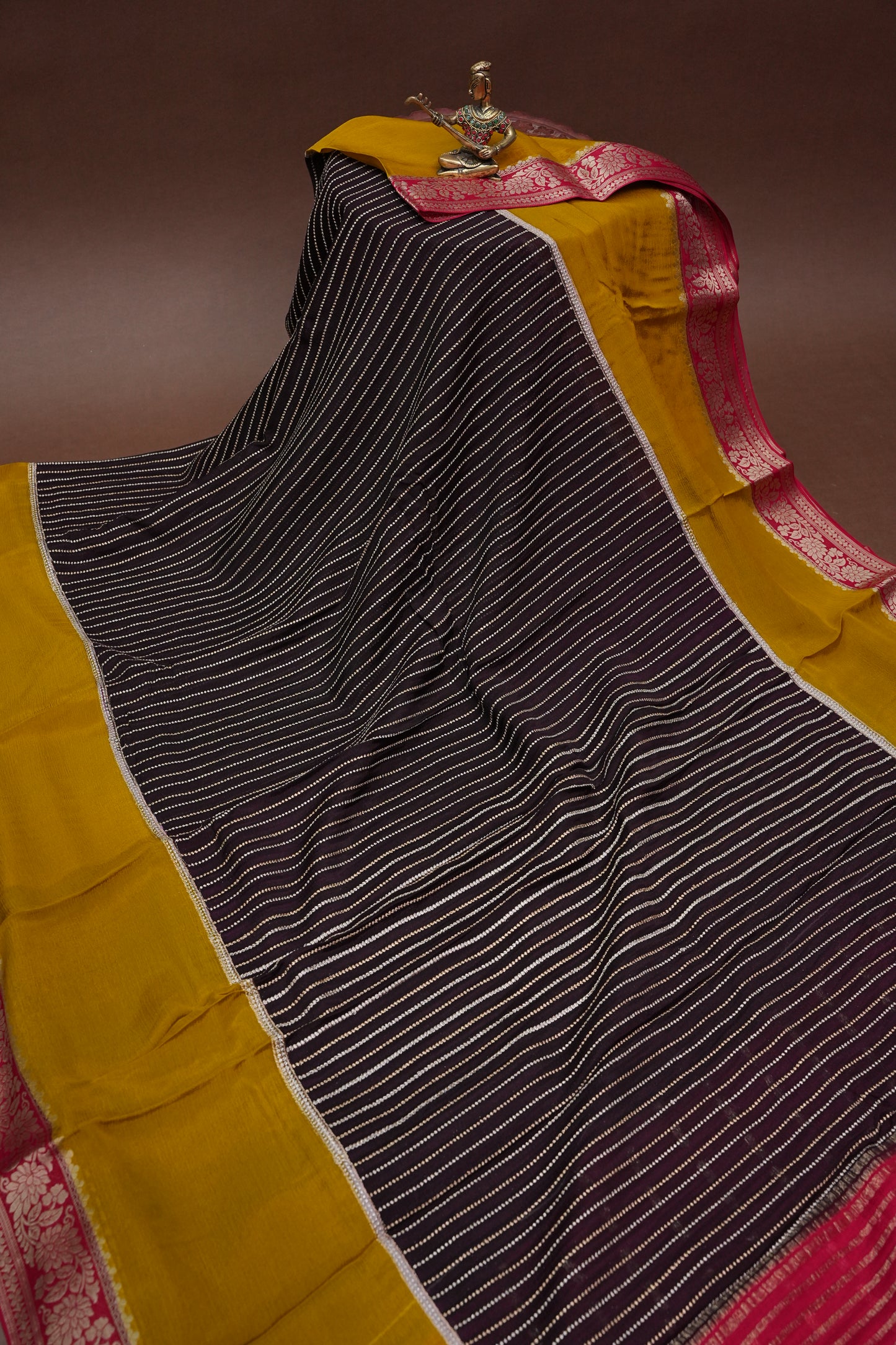 Georgette Crepe Silk Saree in Black with Mustard & Red Borders