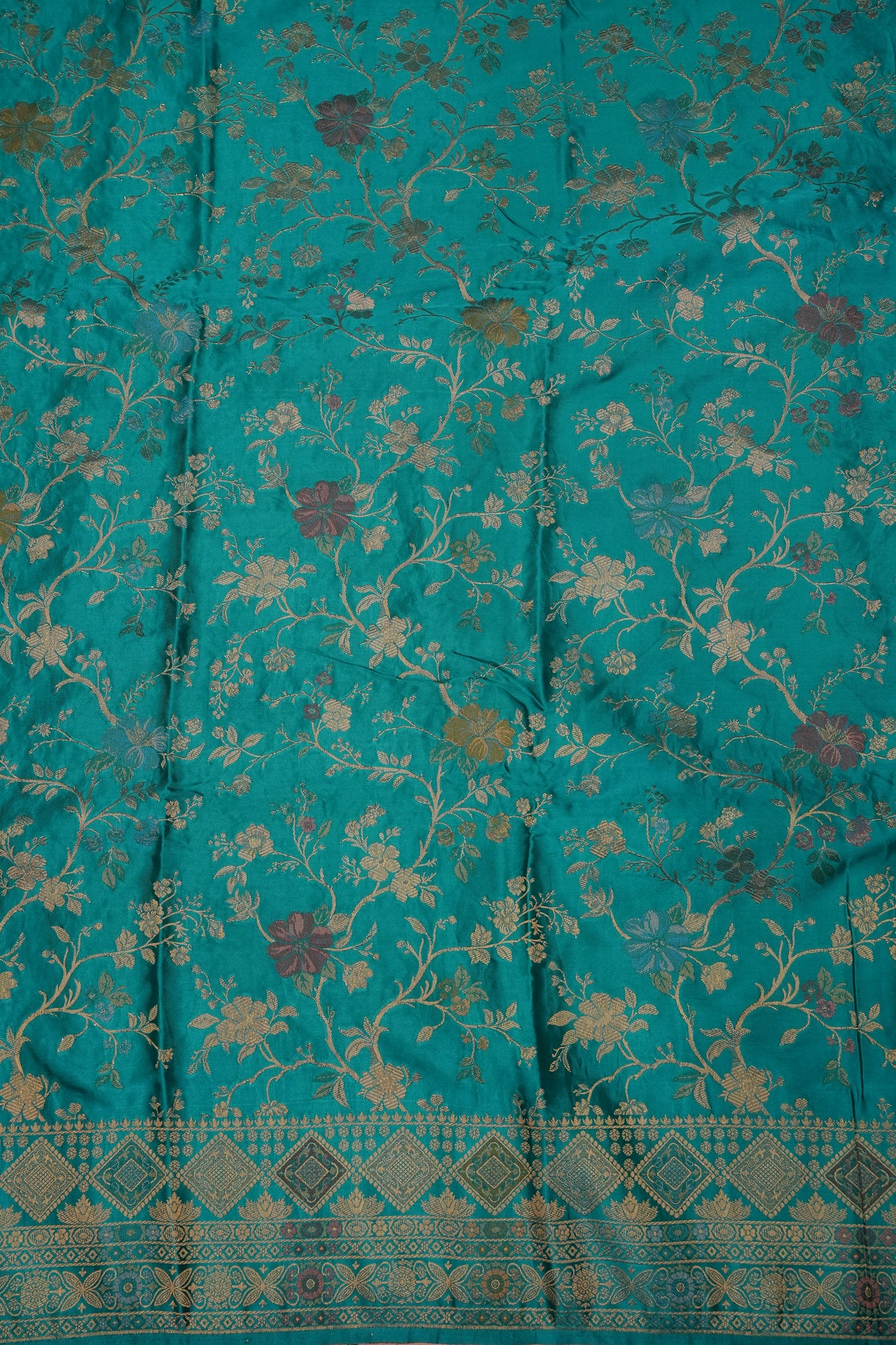 Turquoise Blue Banarasi Satin Silk Saree with Meenakari Floral Zari Weave & Rich Brocade Border-Silk Mark Certified.