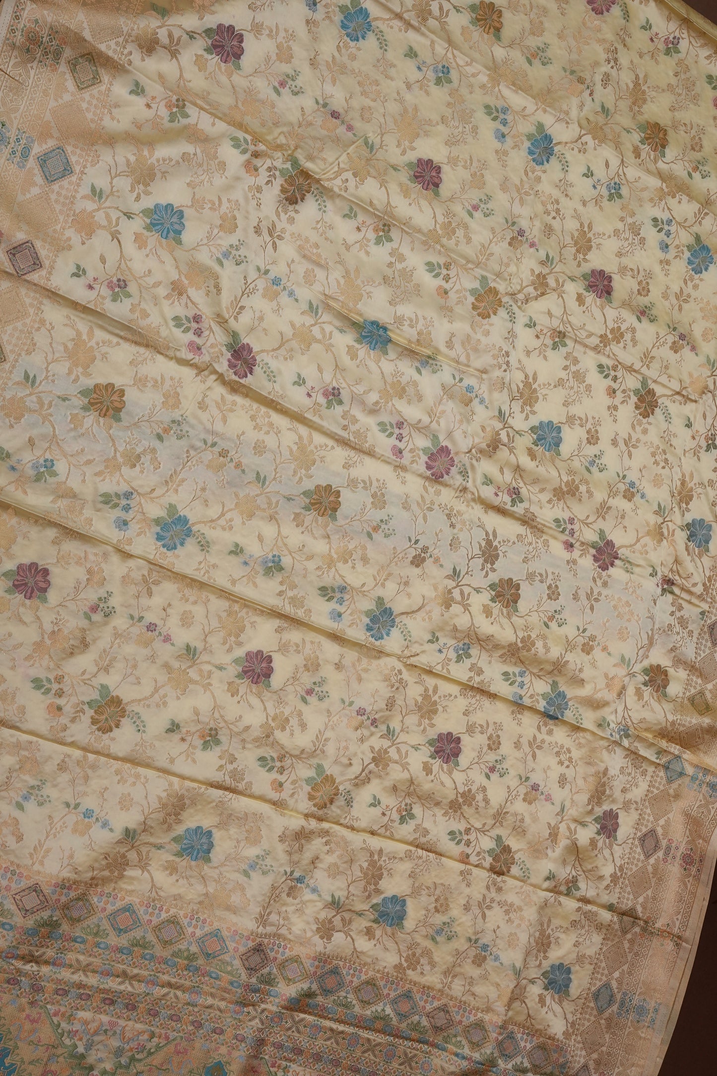Ivory Banarasi Satin Silk Saree with Meenakari Floral Zari Weave & Heritage Brocade Pallu-Silk Mark Certified.