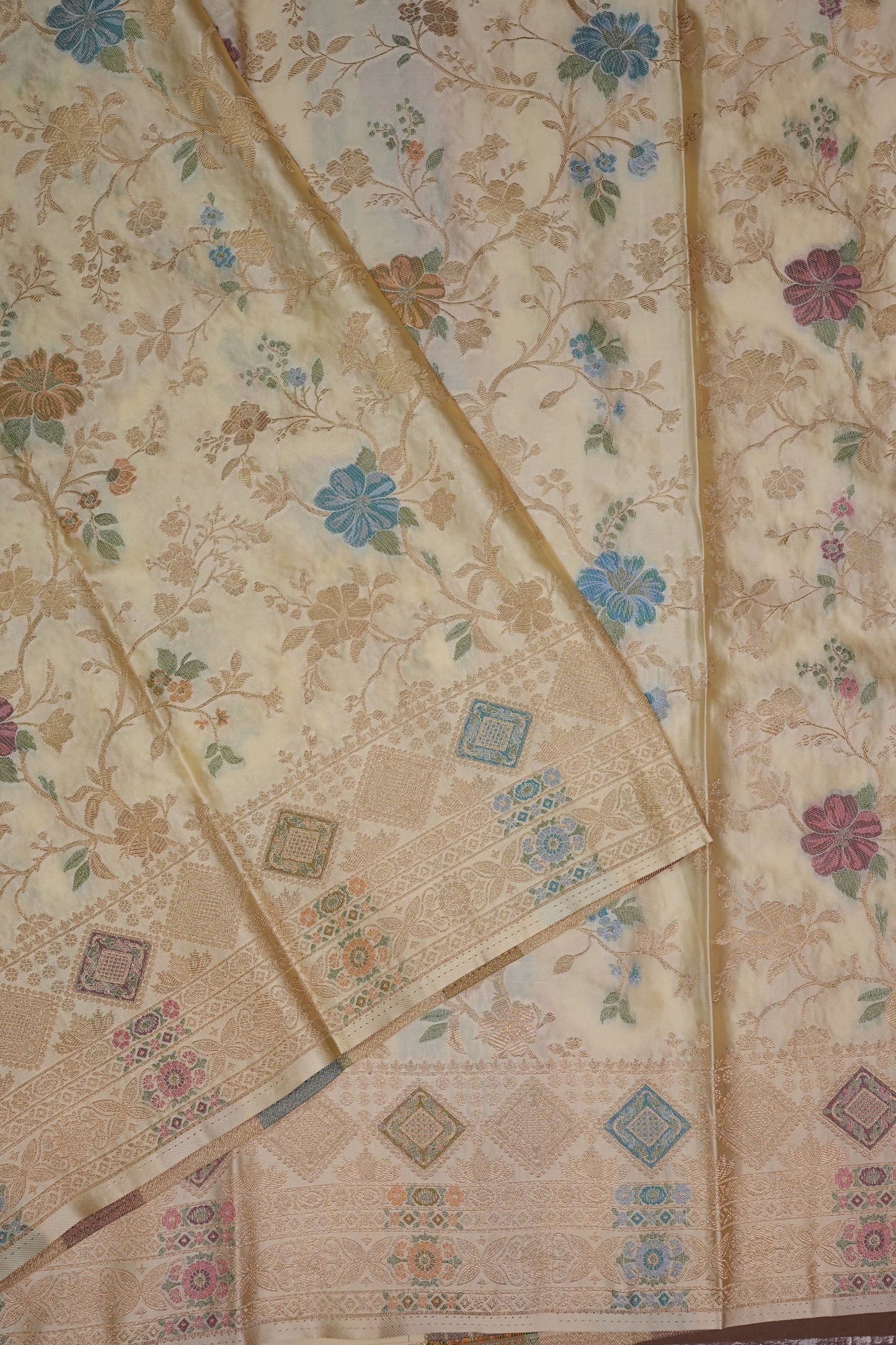Ivory Banarasi Satin Silk Saree with Meenakari Floral Zari Weave & Heritage Brocade Pallu-Silk Mark Certified.