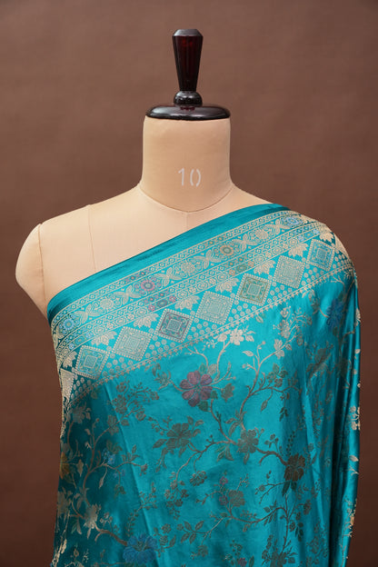 Turquoise Blue Banarasi Satin Silk Saree with Meenakari Floral Zari Weave & Rich Brocade Border-Silk Mark Certified.