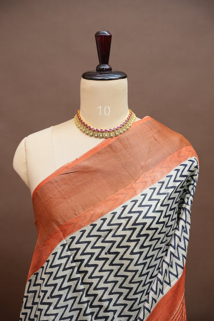 Silk Mark Certified Pure Tussar Silk Saree – Ivory Chevron Weave with Terracotta Orange Pallu