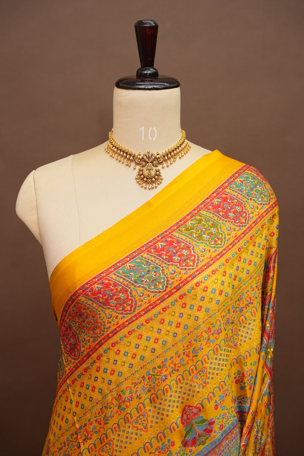 Semi Georgette Saree with Royal Palace Heritage Print – Mustard