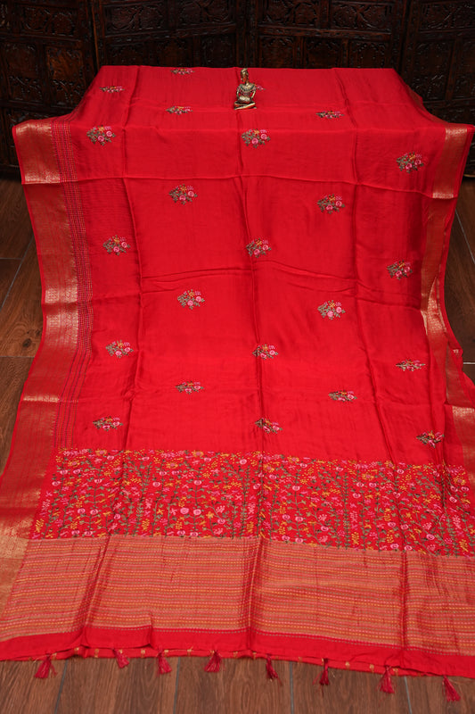 Bright Red Crepe silk saree with French knot work.