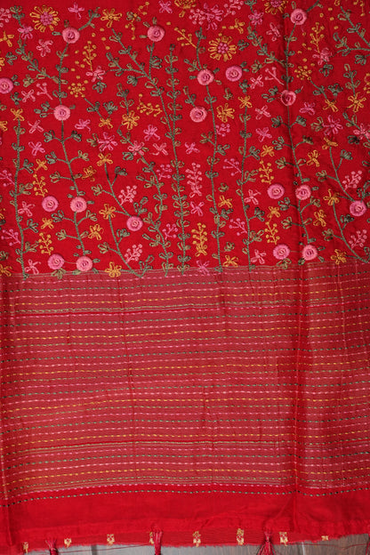 Bright Red Crepe silk saree with French knot work.